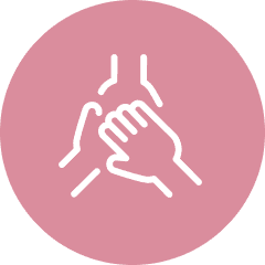A pink circle with an icon showing three hands raised in celebration
