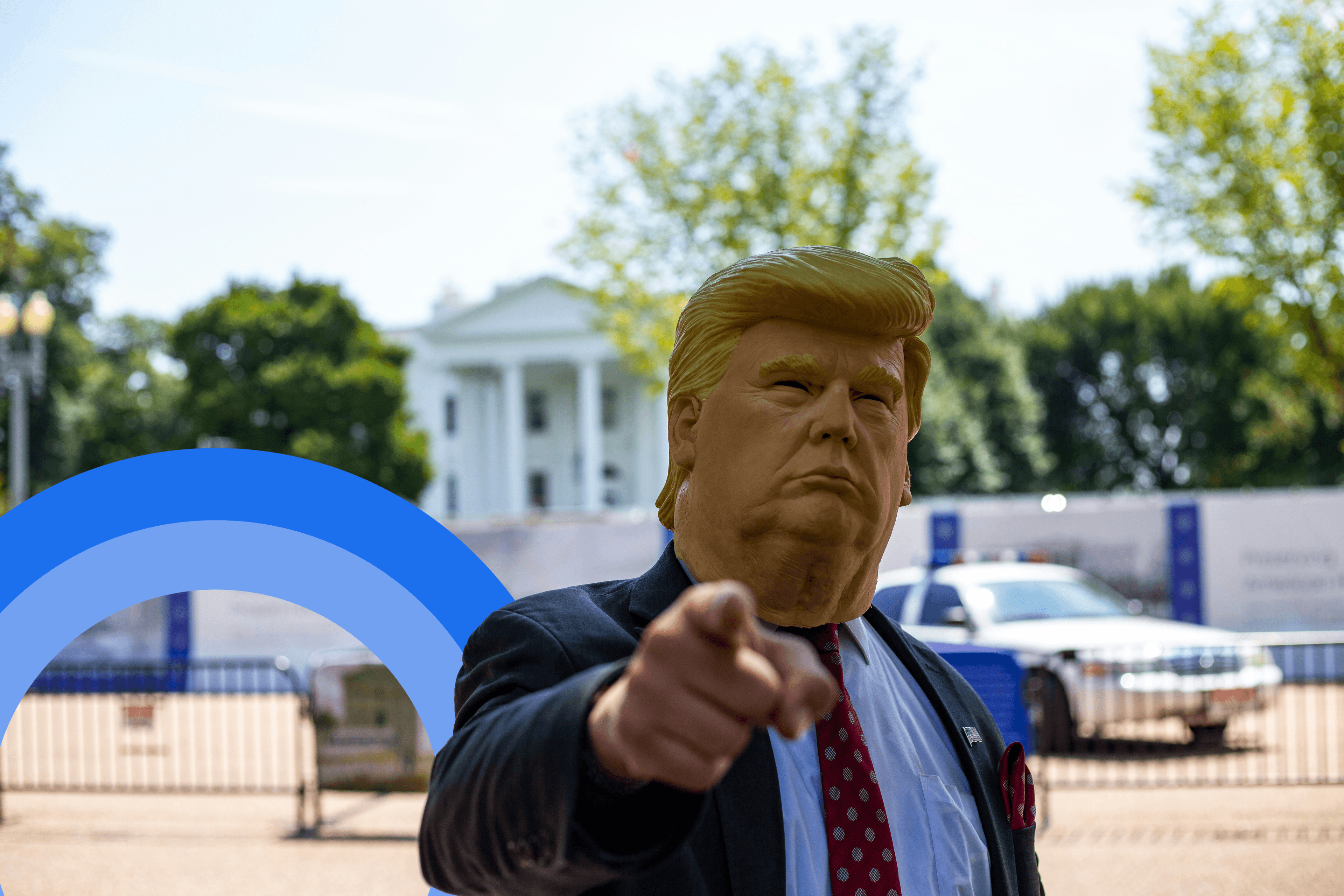 A man in a Donald Trump mask